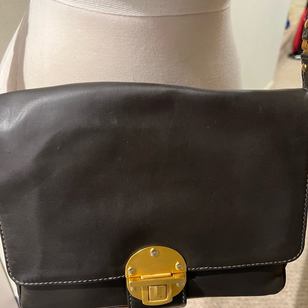 Donna karen vintage leather purse with gold hardware.